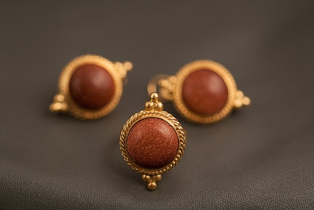 Gold ring and earrings