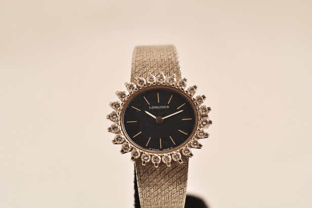 white gold wristwatch